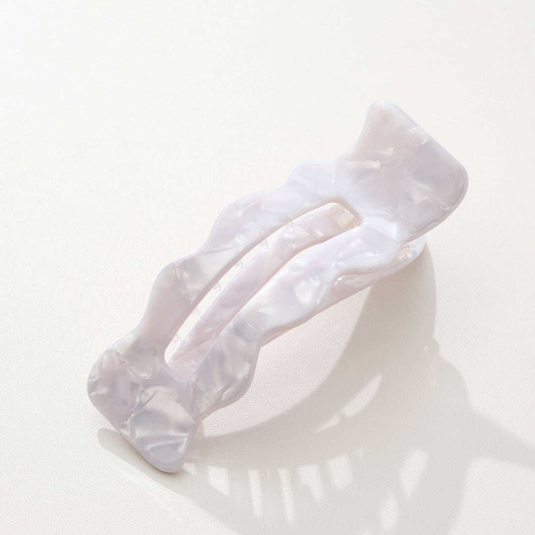 Ivory hair clip on a white background 