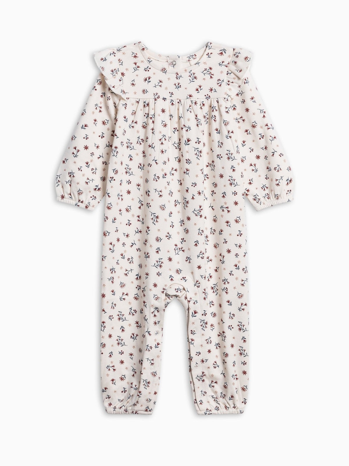 A Colored Organics' Jine Ruffle Sleeve Romper in cassia floral on a white background.