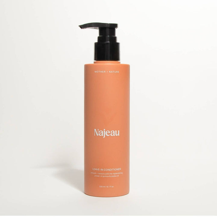 Orange bottle with black pump labeled &