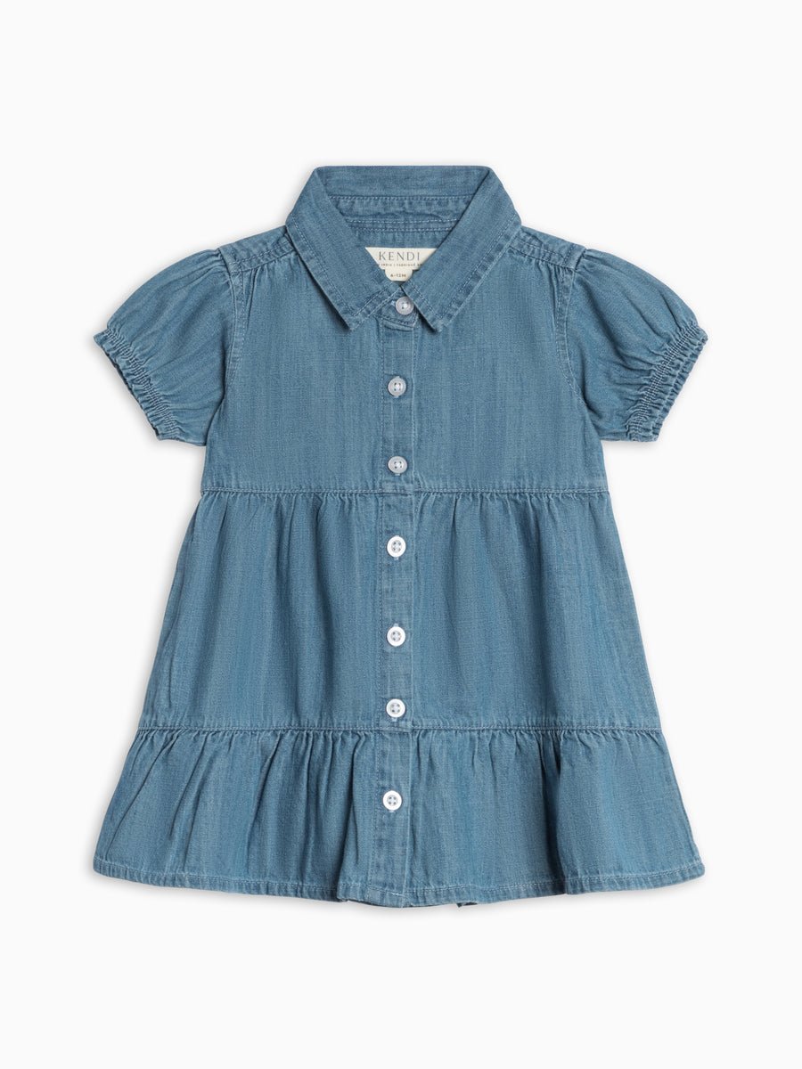 Blue chambray dress with ruffled sleeves on a white background