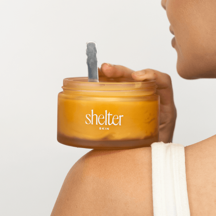 Person holding a jar of &