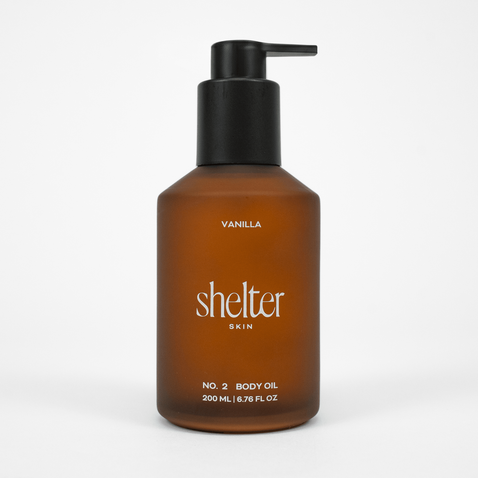 Shelter Skin's No. 2 Vanilla Body Oil on a white background
