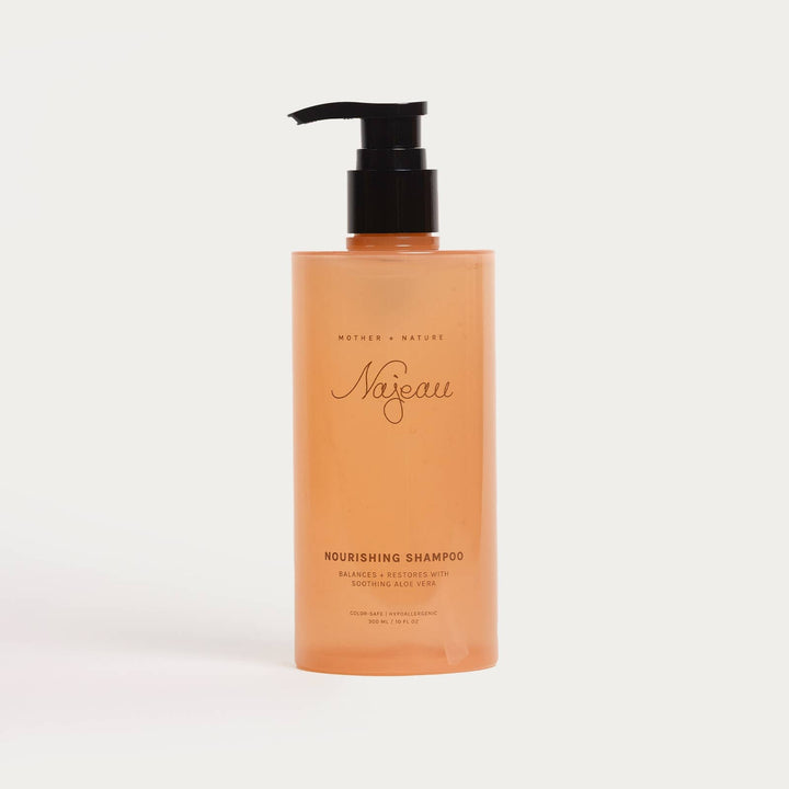 Nourishing shampoo bottle with pump on a light gray background