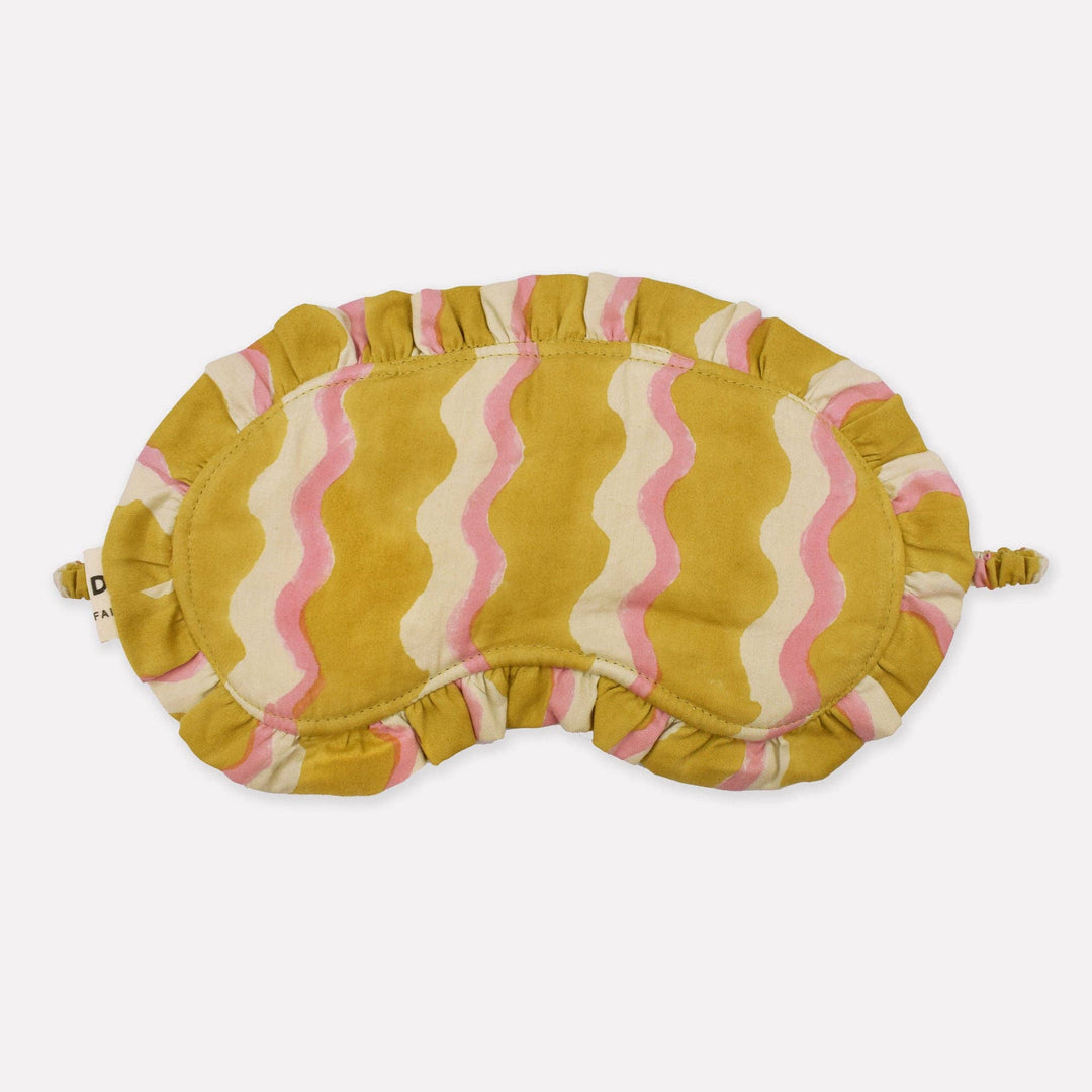 Eye mask with wavy pattern on a white background