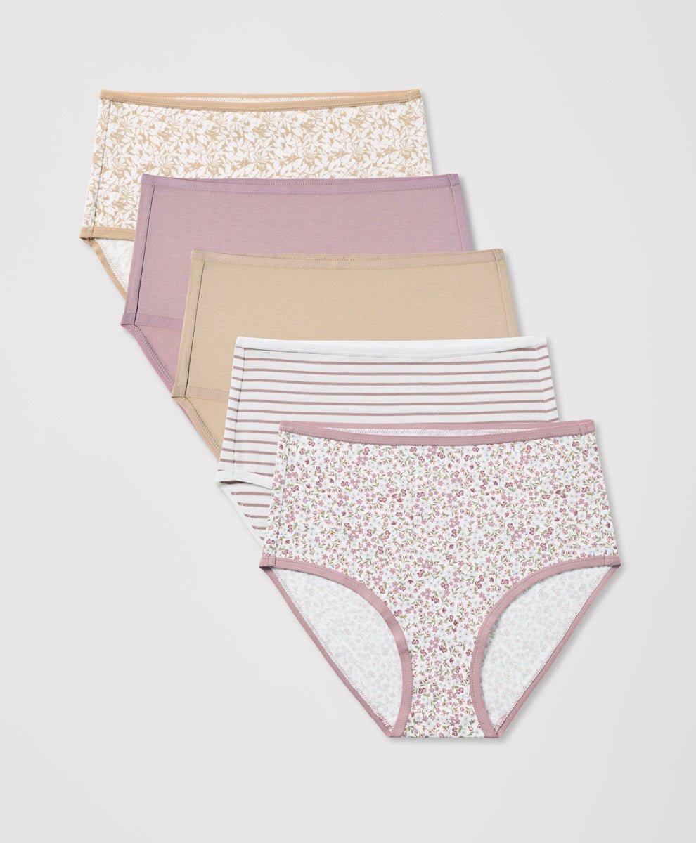 Set of women's underwear with floral, striped, and solid patterns on a light gray background