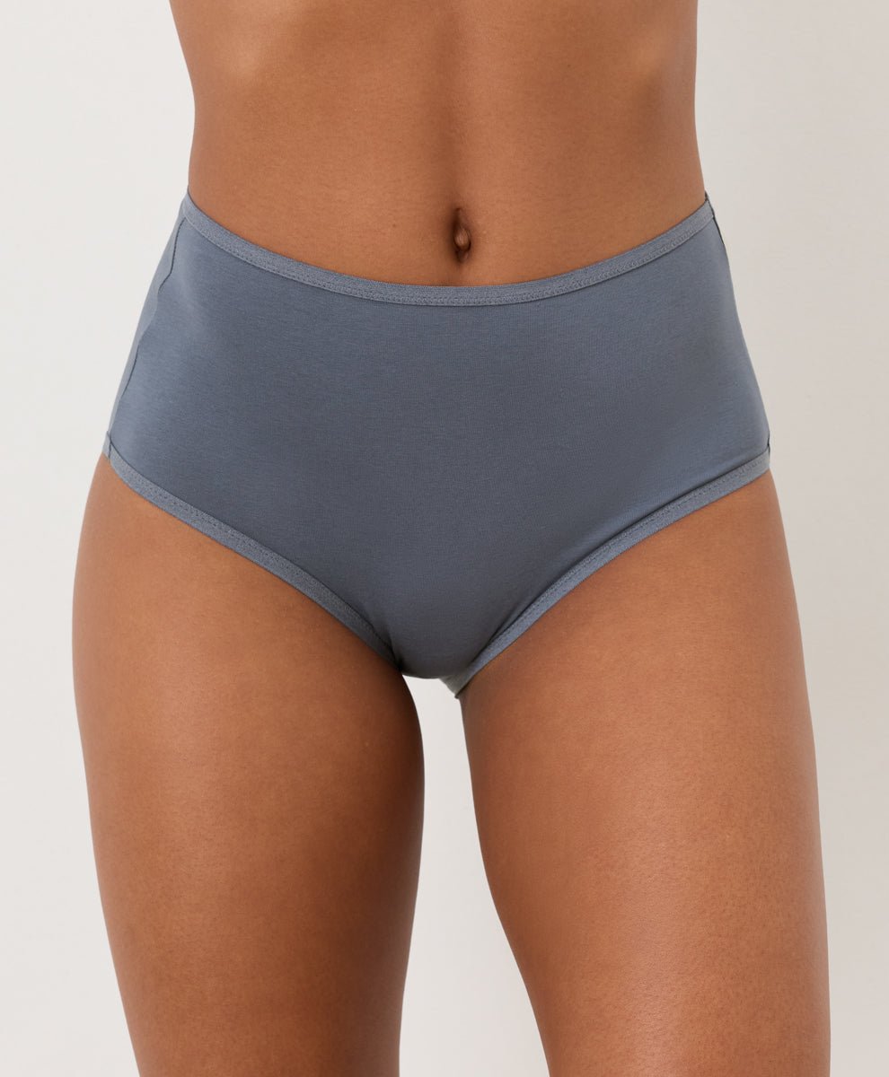 Smoke Blue high-waisted underwear worn by a person on a plain background