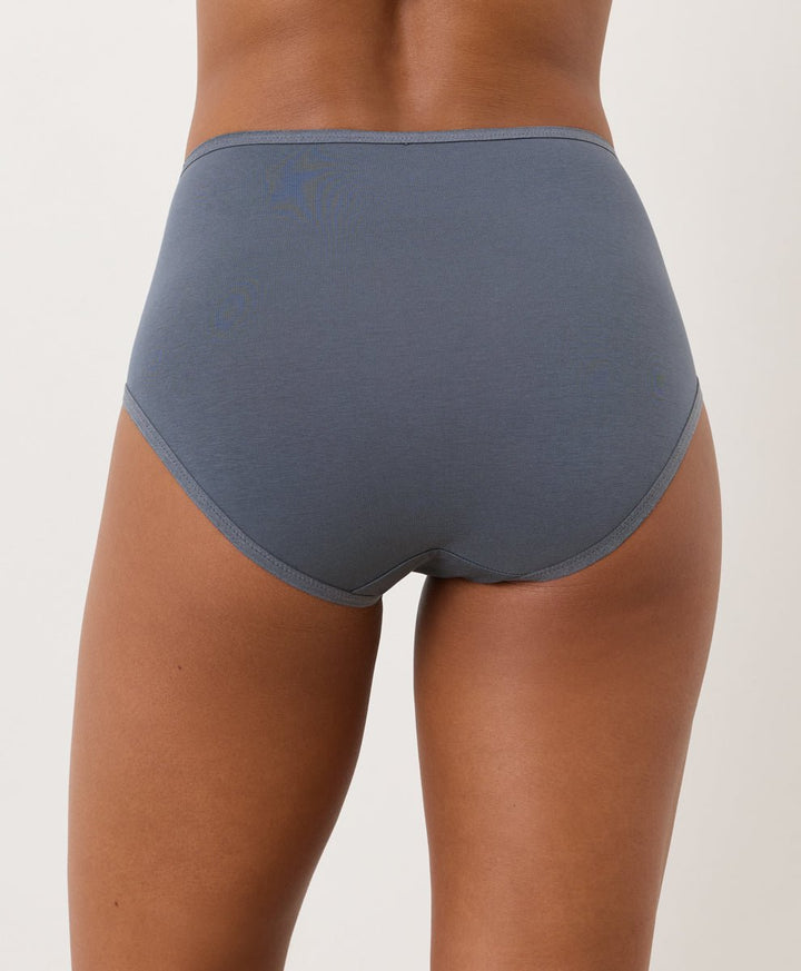 Smoke Blue high-waisted underwear worn by a person on a plain background