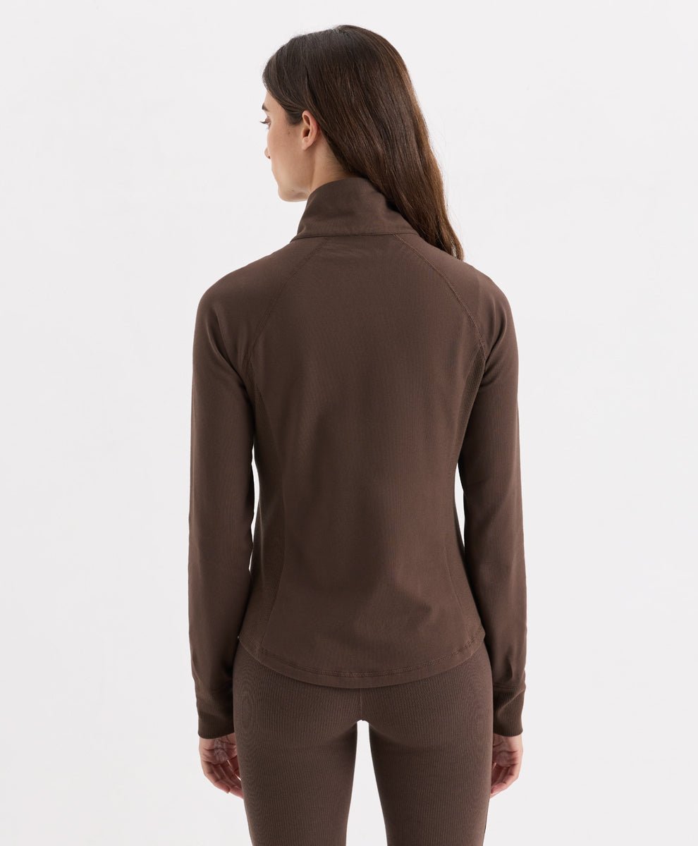 A woman shown from the back wearing Pact&