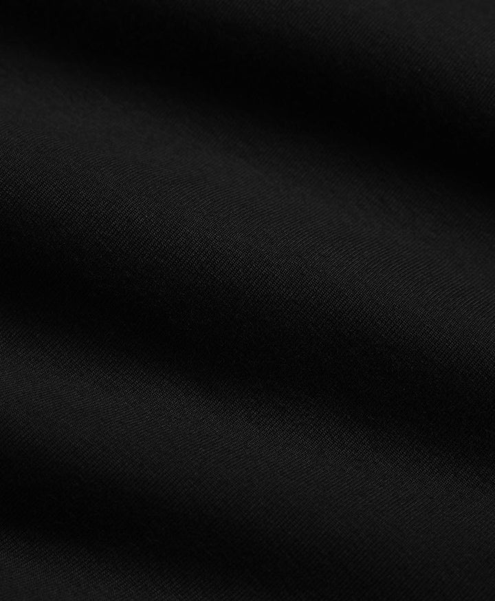 Solid black fabric swatch