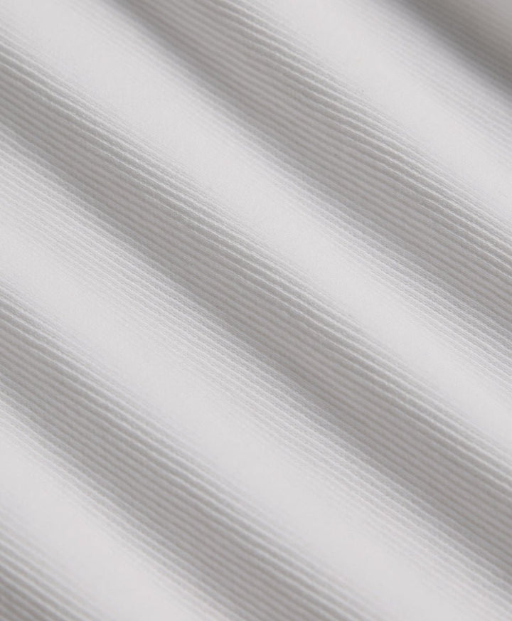 Close-up of textured rib white fabric.