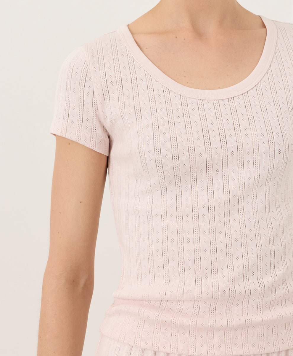 Close-up of a woman wearing Pact&