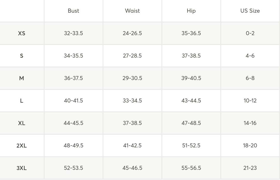 A size chart table with columns for Bust, Waist, Hip, and US Size, listingXS through 3XL sizes in a clean grid format.