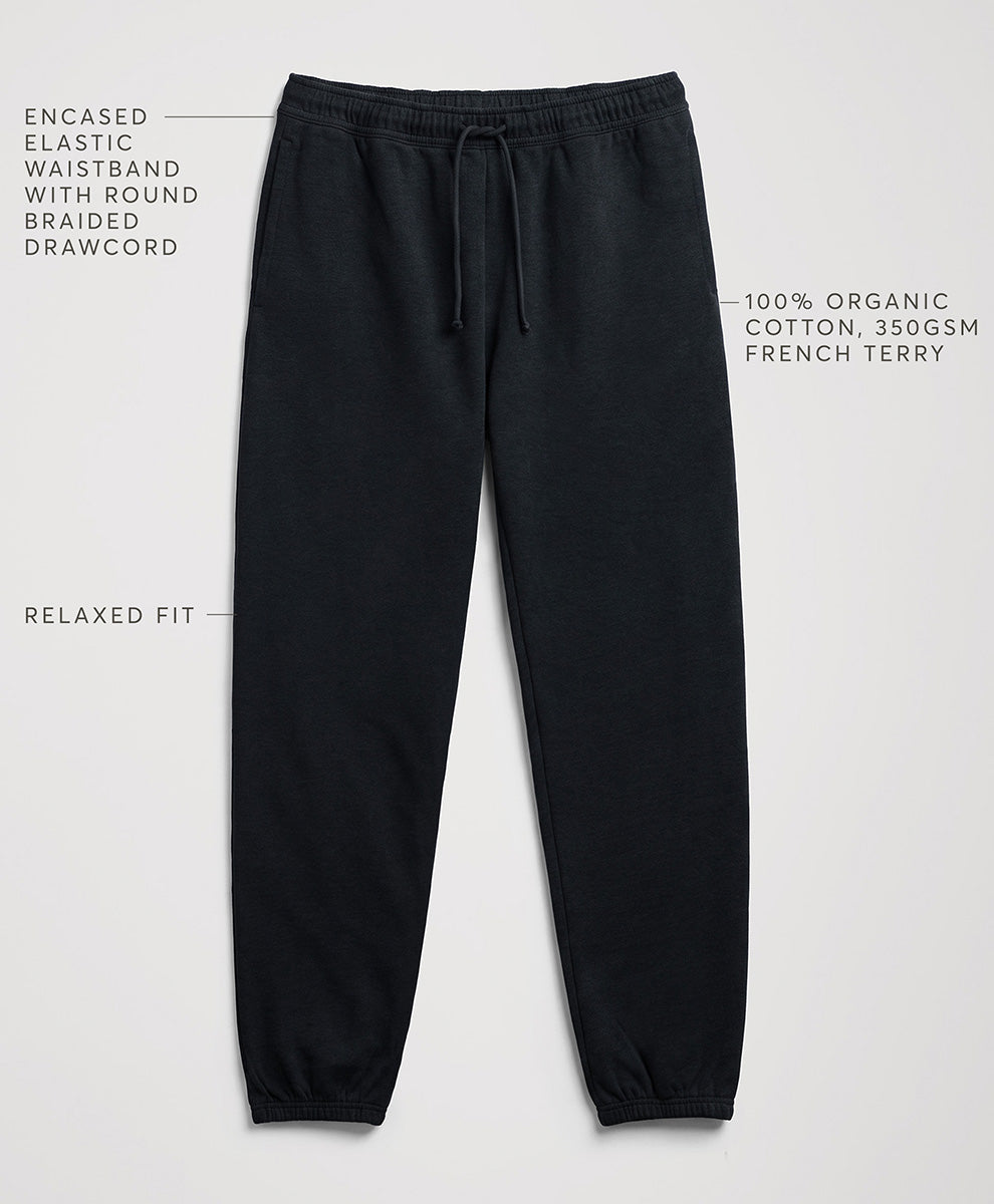 charcoal heather jogger sweatpants with text callouts highlighting features like the encased elastic waistband, relaxed fit, and 100% organic cotton fabric, shown on a light gray background.