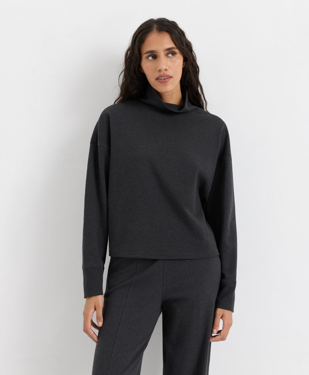 A woman modeling Pact&