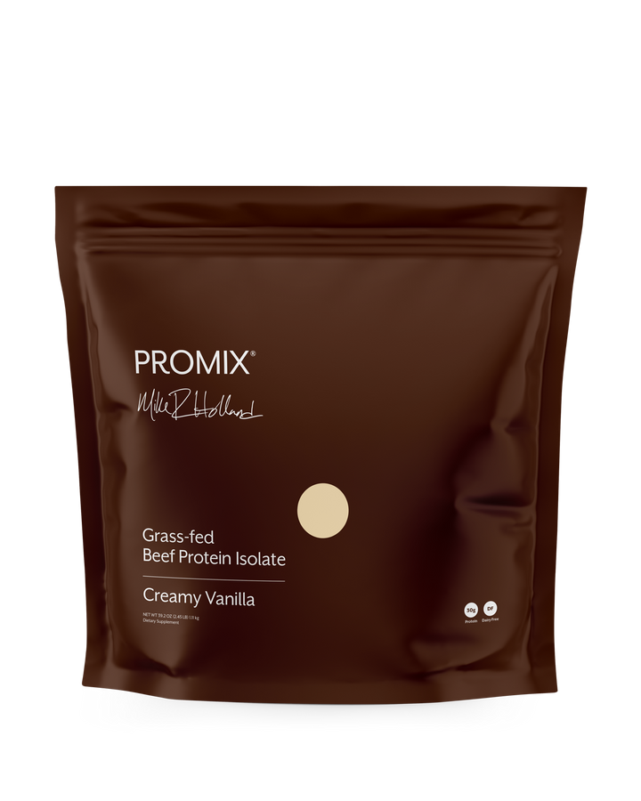 A dark brown stand-up pouch of PROMIX  Grass-fed Beef Protein Isolate in Creamy Vanilla flavor, shown on a clean white background.