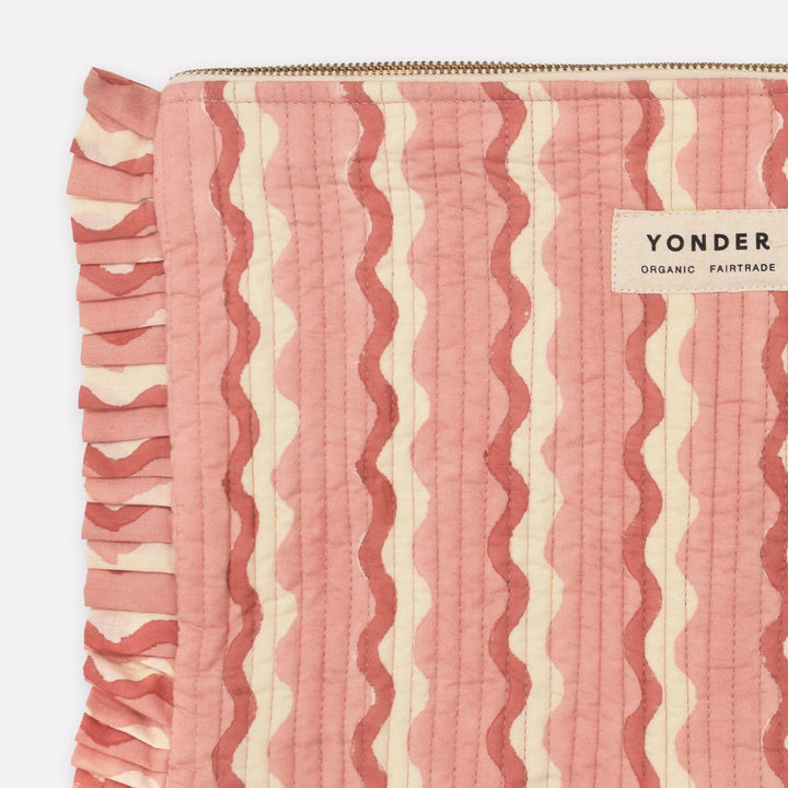 Pink and white striped fabric with &