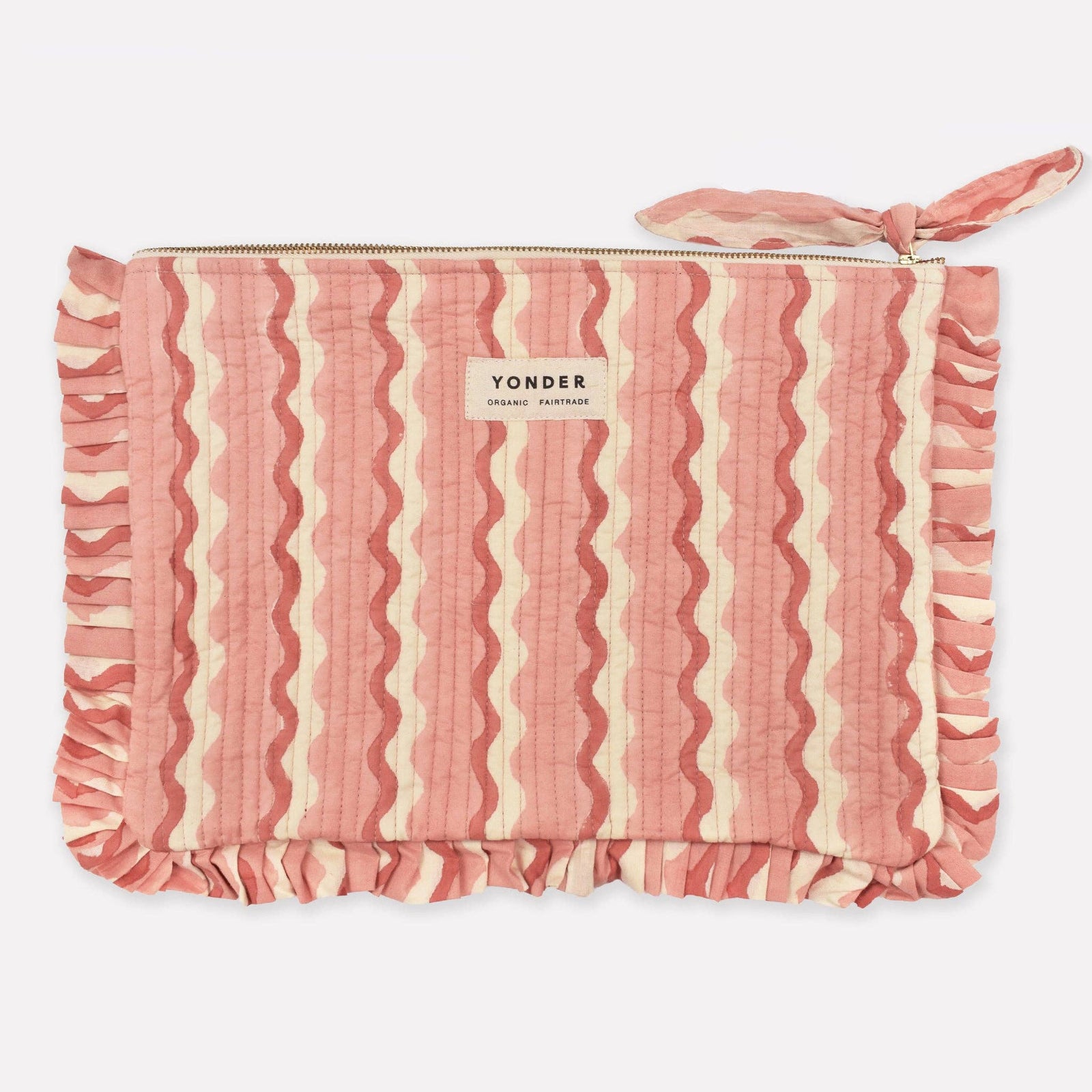 Pink and white striped pouch with 'Yonder' branding on a white background