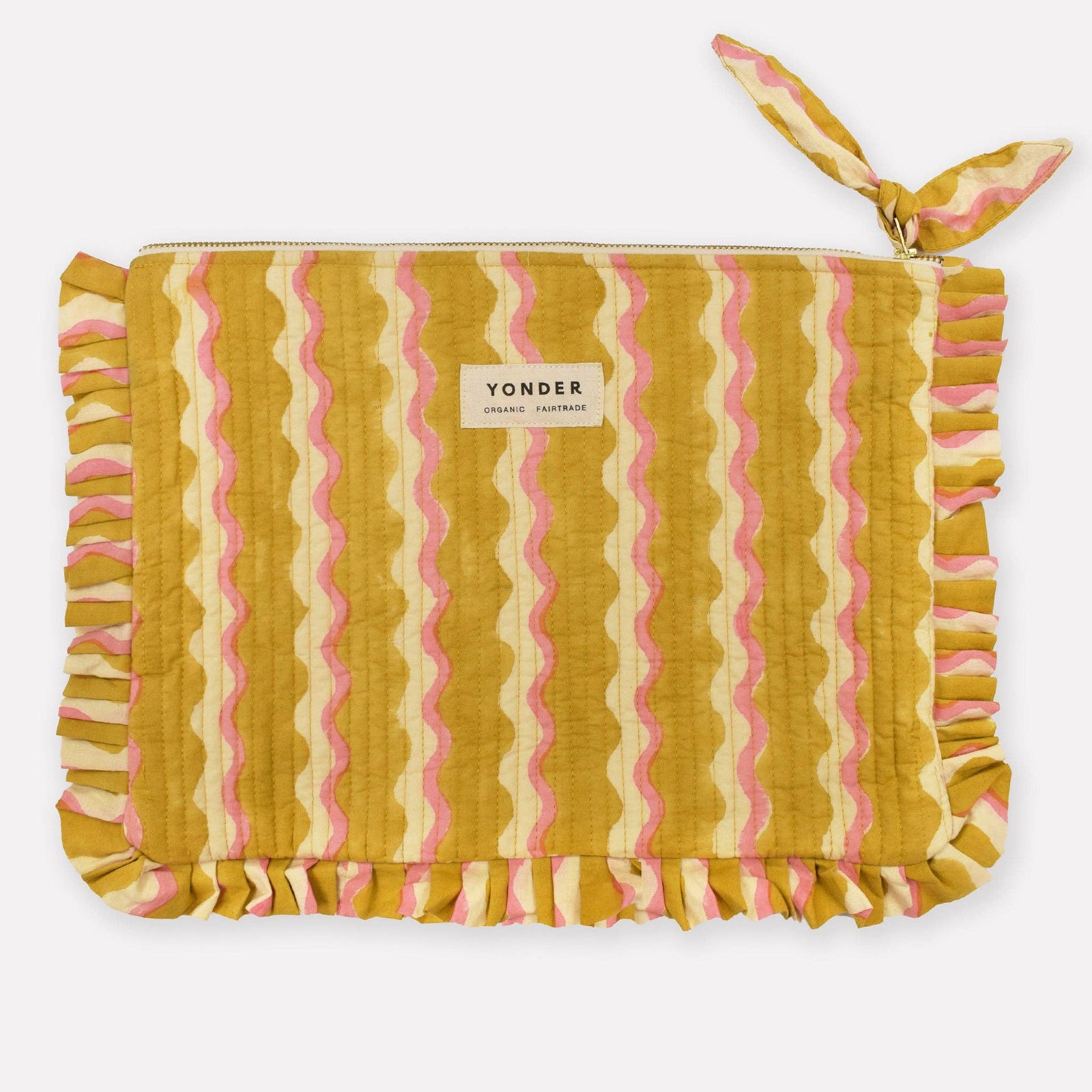 Striped pouch with ruffled edges and 'Yonder' branding on a white background