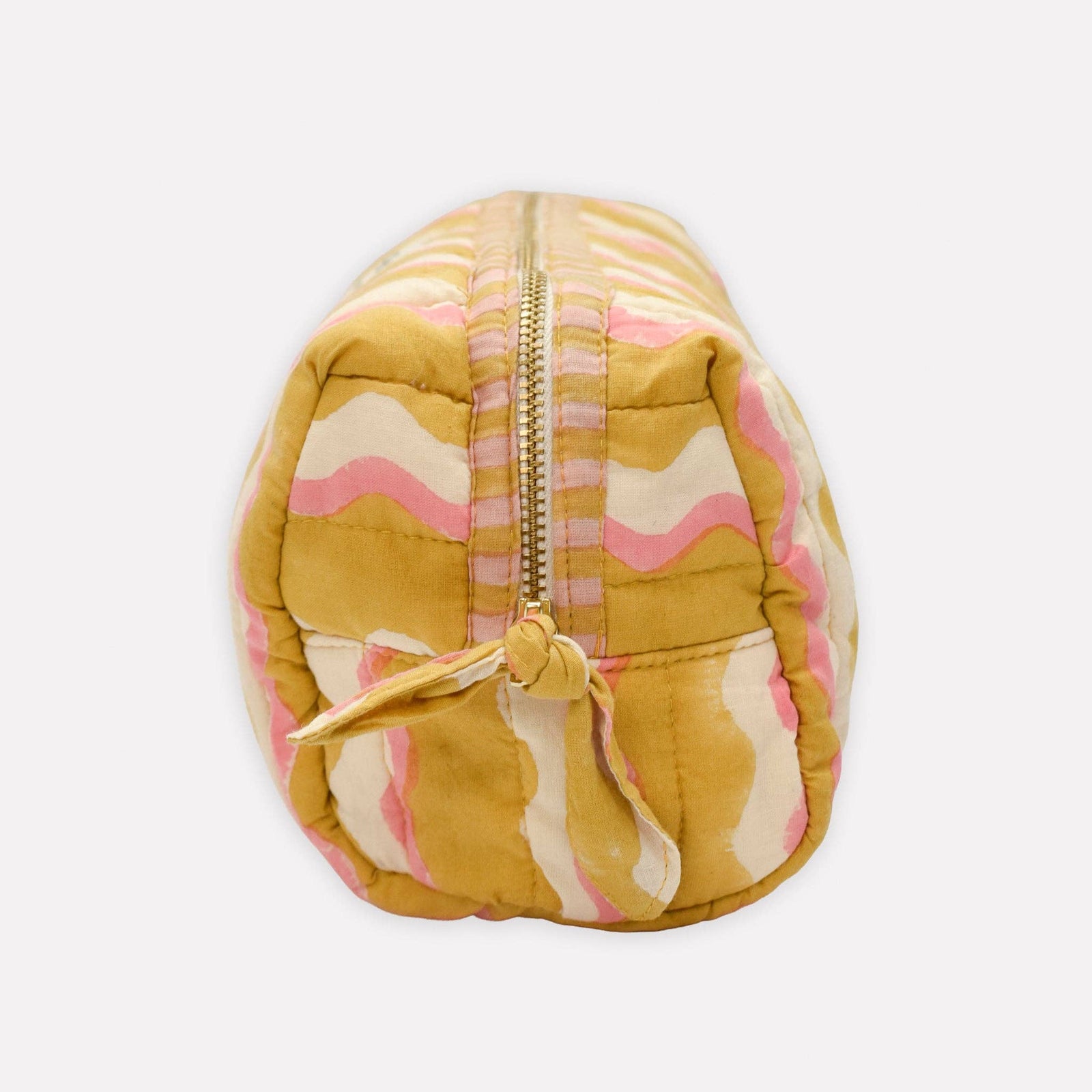 Round pouch with a zipper, featuring a yellow and pink pattern on a white background