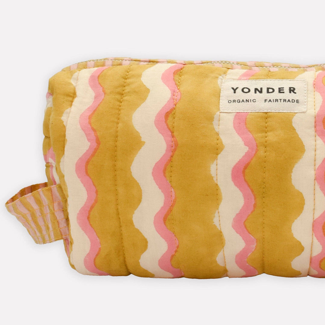 Quilted pouch with wavy pattern and &