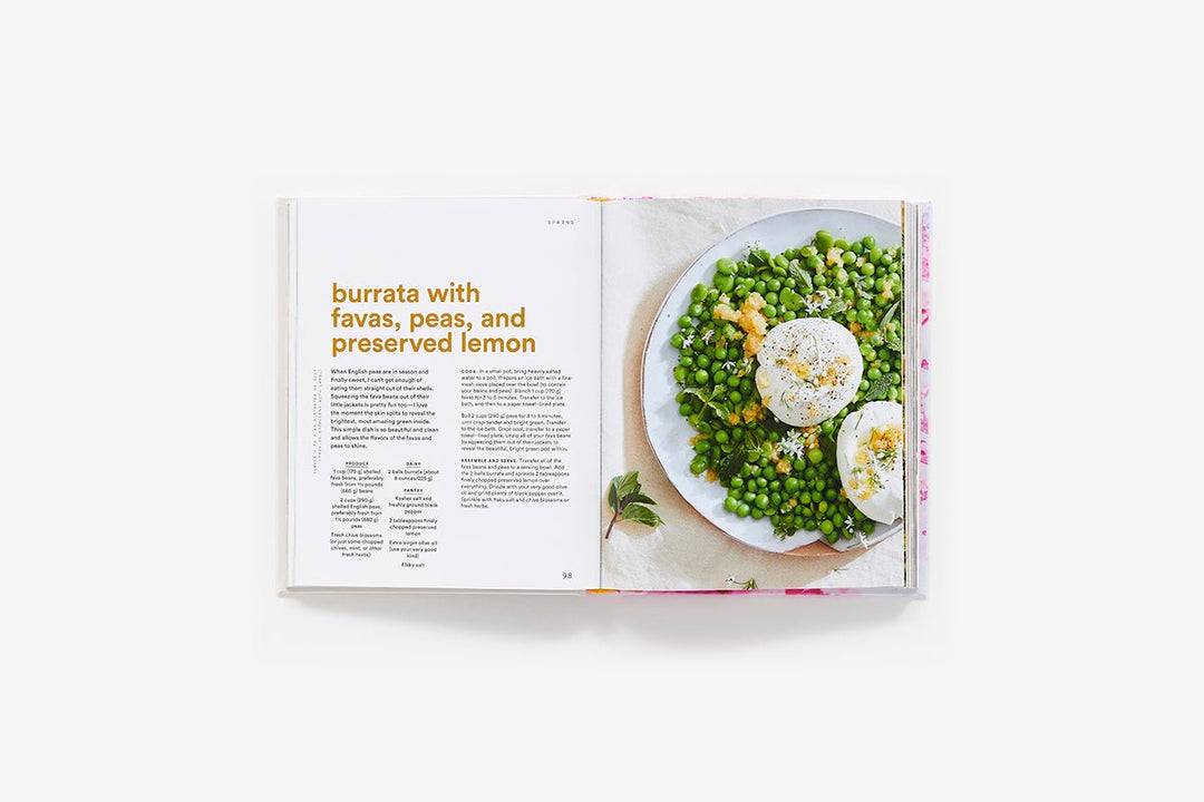 Open cookbook showing a recipe for burrata with favas, peas, and preserved lemon on a white background.