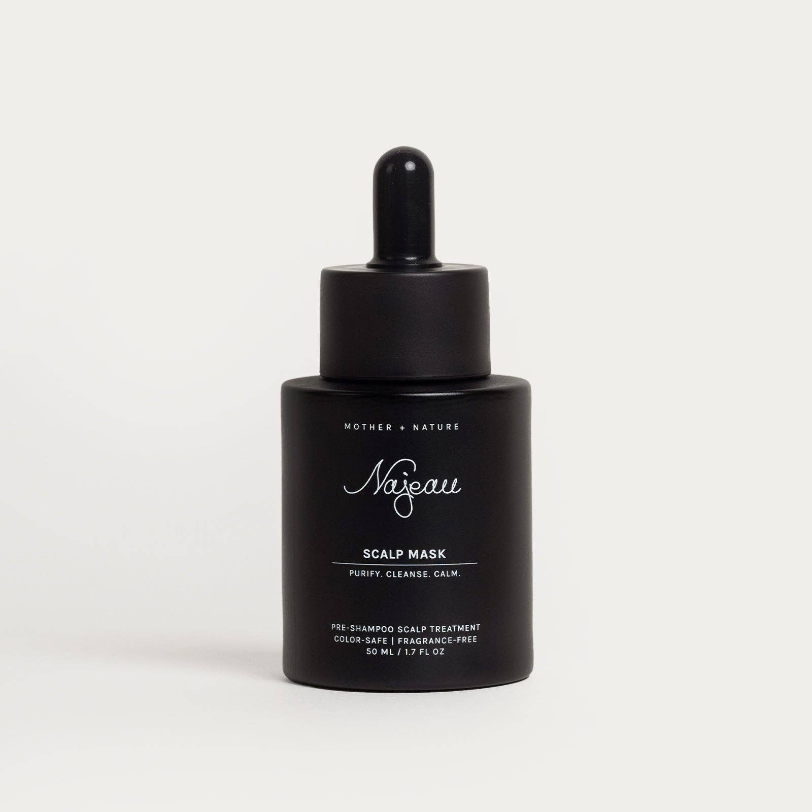 Black bottle of Najeau Scalp Mask on a light gray background