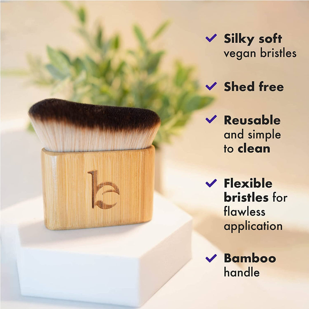 Self Tanner Blending Body Brush with bamboo handle on a light background with text highlighting features