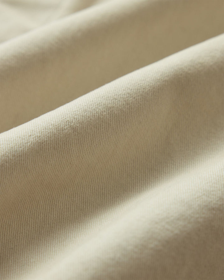 Close-up of Organic Aged Stone Foundation Twill fabric with a soft texture