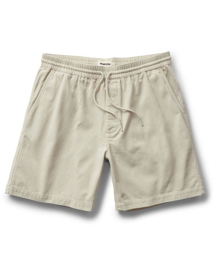 Taylor Stitch The Après Short in Organic Aged Stone Foundation Twill with drawstring on a white background