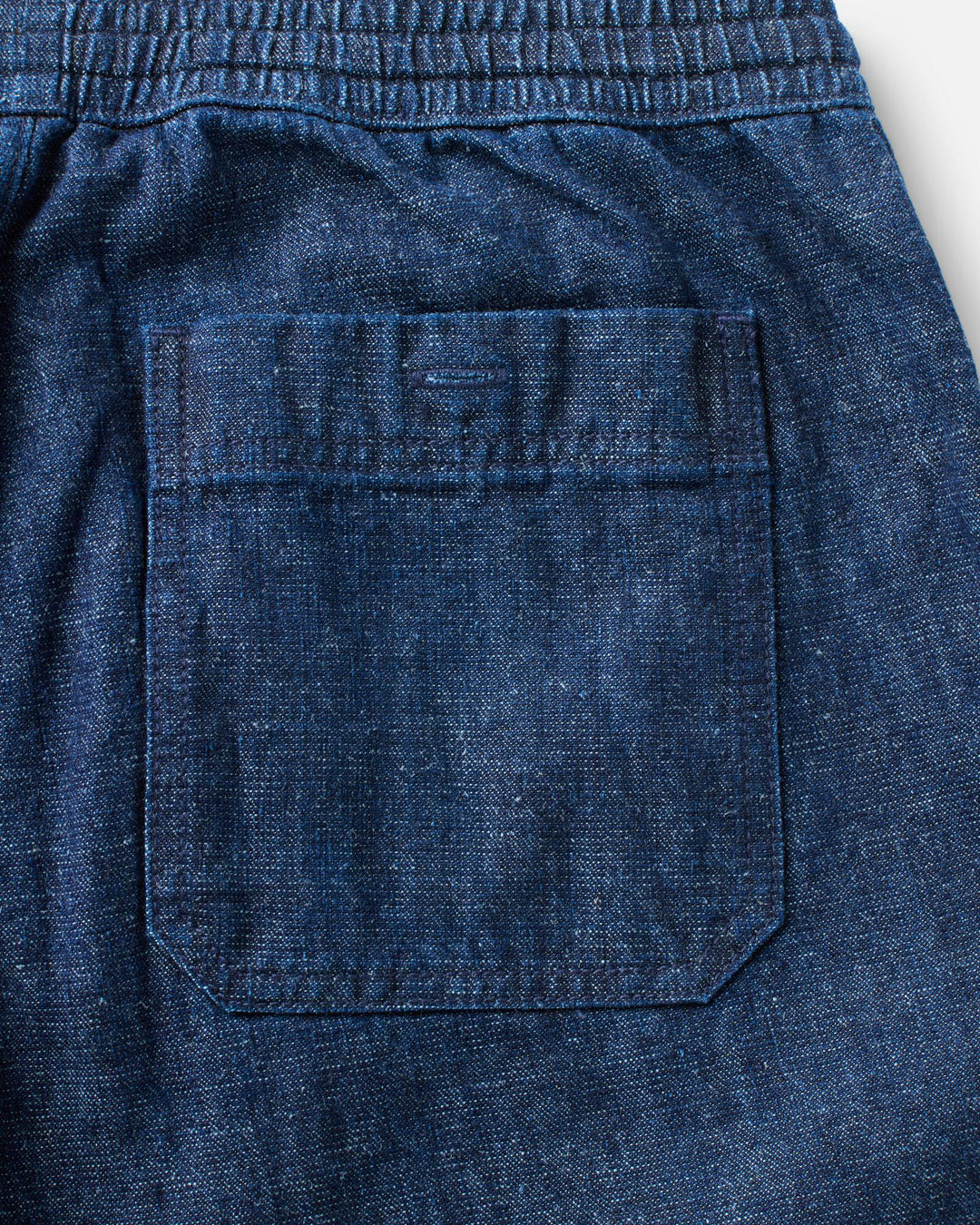 Close up of Taylor Stitch Breakwater pants back pocket.