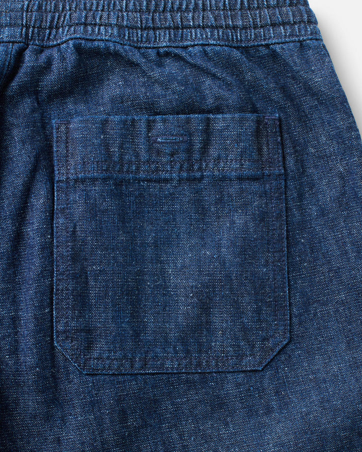 Close up of Taylor Stitch Breakwater pants back pocket.