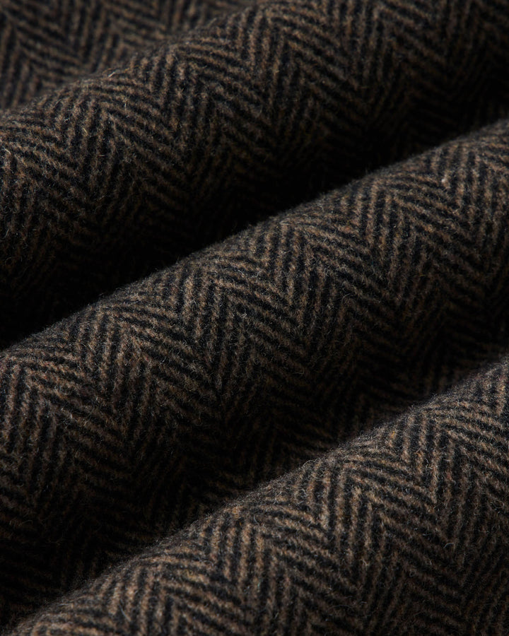 A close-up of the Carnegie Pant
in Walnut Herringbone Wool.