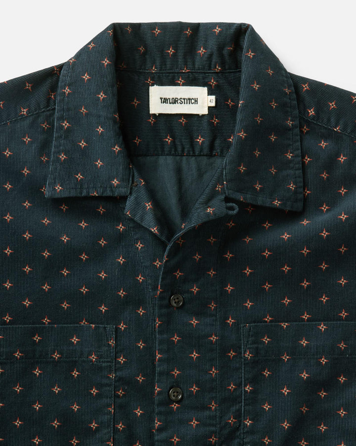 Dark shirt with small pattern and &
