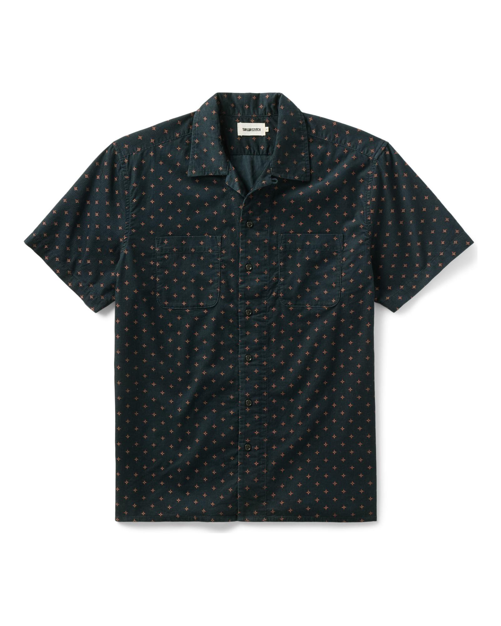 Dark patterned short-sleeve shirt on a white background