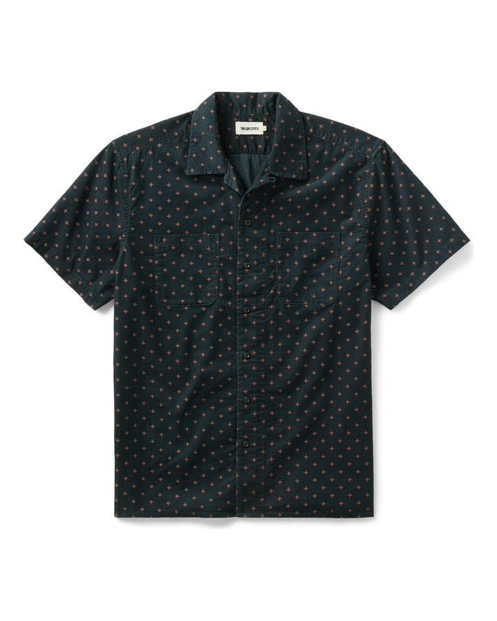 Dark patterned short-sleeve shirt on a white background
