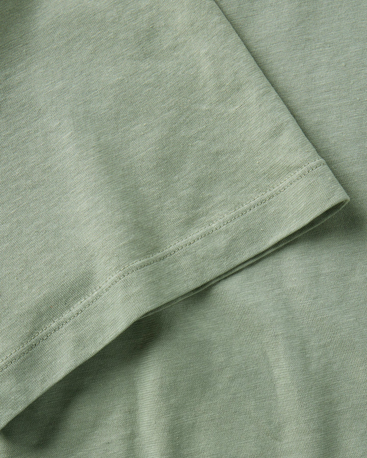 Close-up of The Cotton Hemp Polo in Sage by Taylor Stitch.