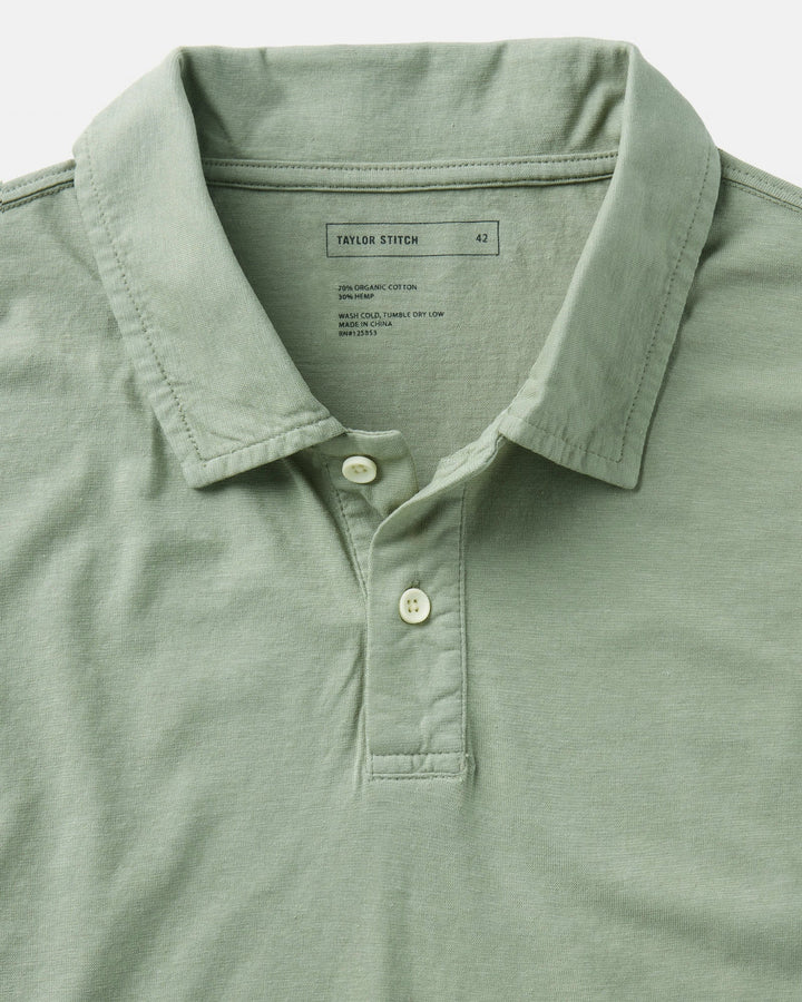 The Cotton Hemp Polo in Sage by Taylor Stitch on a white background