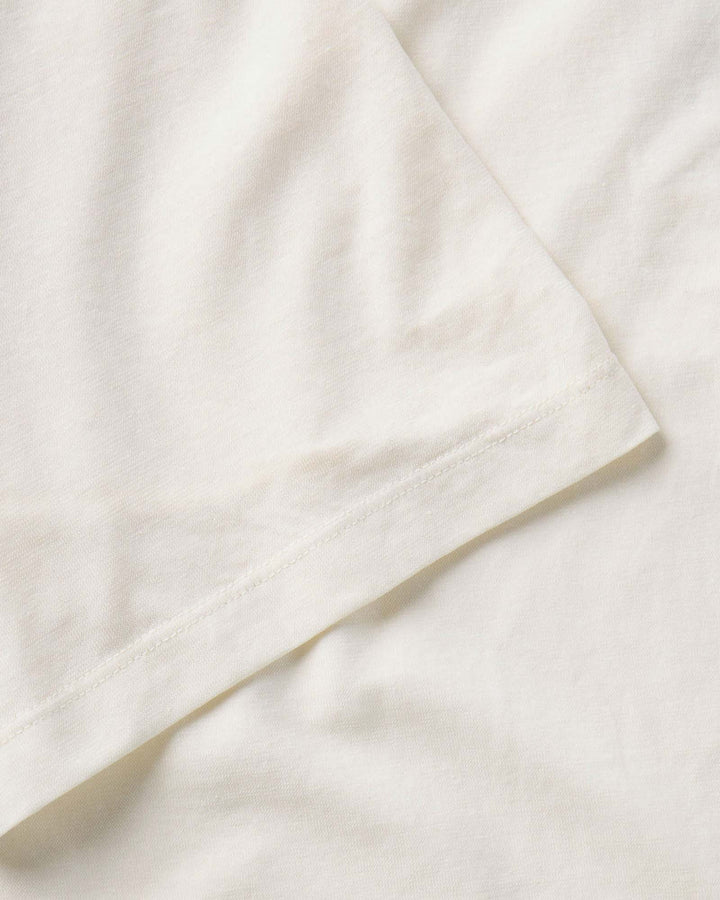 Close up of The Cotton Hemp Polo in Vintage White by Taylor Stitch.