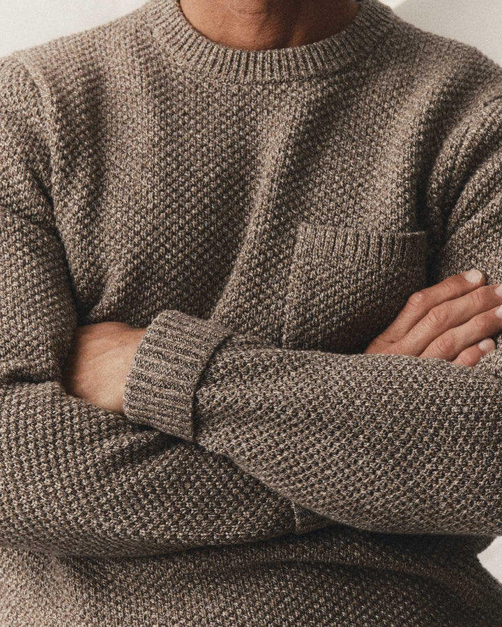 A close-up of a man wearing Taylor Stitch&