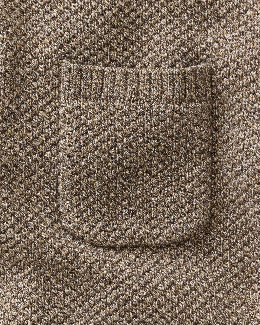 Close-up of the Crawford Crew Sweater in Coffee Twist with a ribbed pocket.