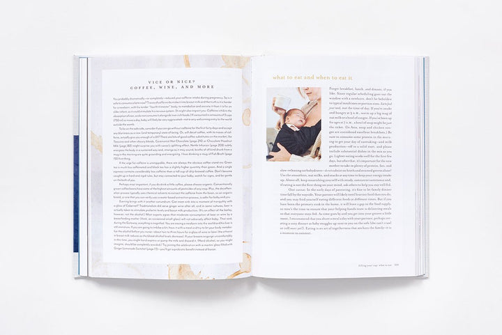 Open book with text and a photo of a baby on a white background