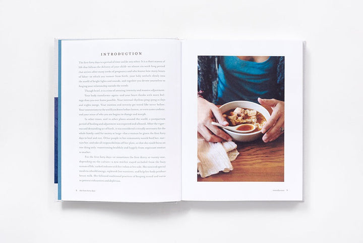 Open book showing an introduction on one page and a photo of hands holding a bowl of food on the other, on a white background.