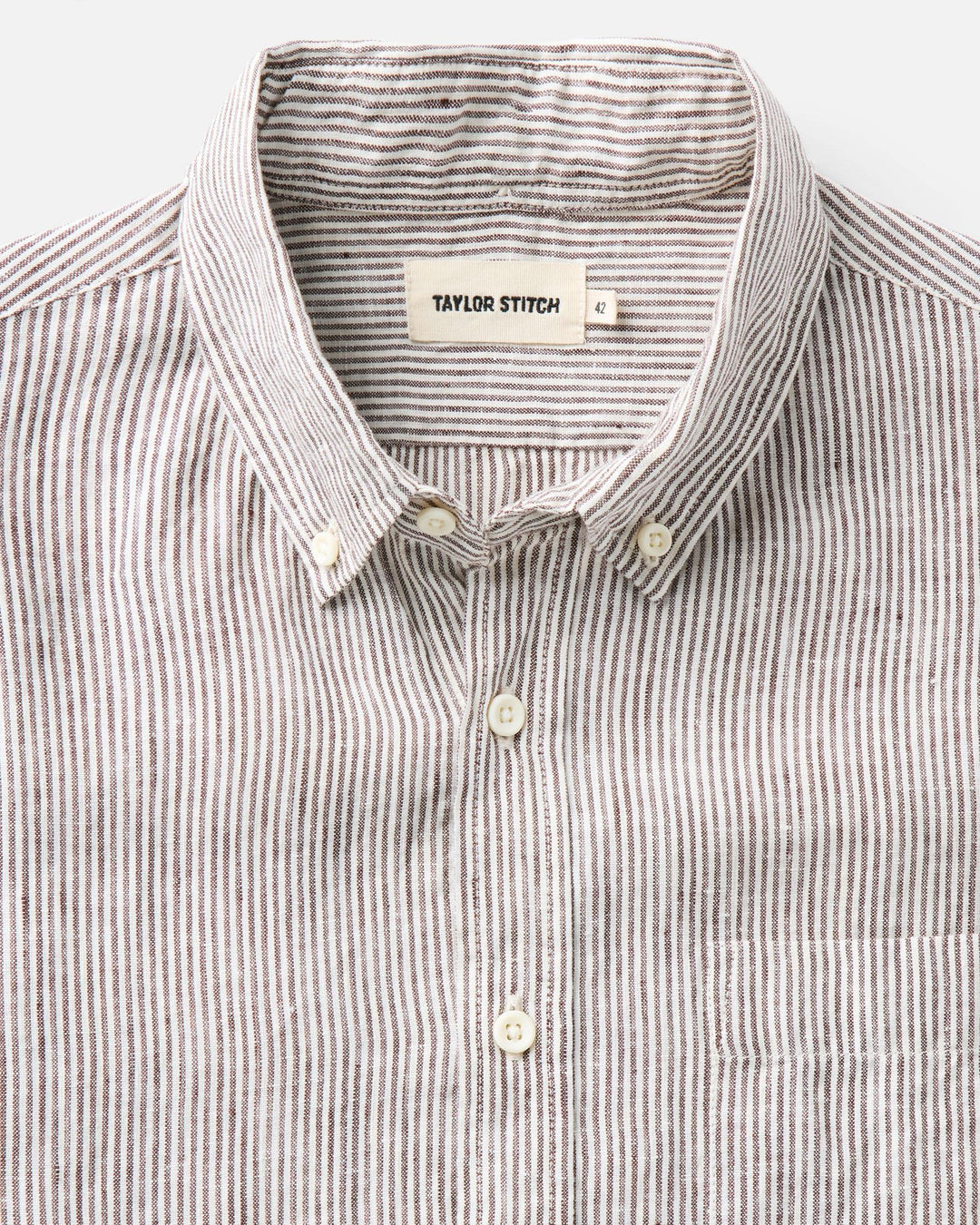 Close-up of a Burgundy University Stripe Linen shirt with &