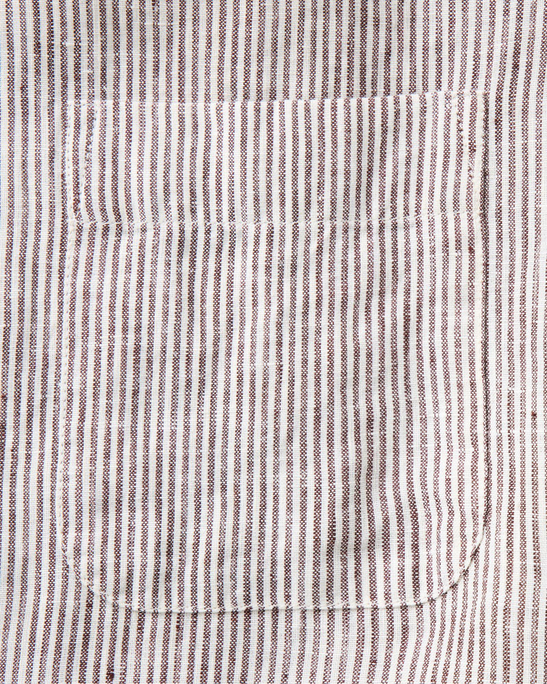 Close-up of a Burgundy University Stripe Linen fabric and pocket.