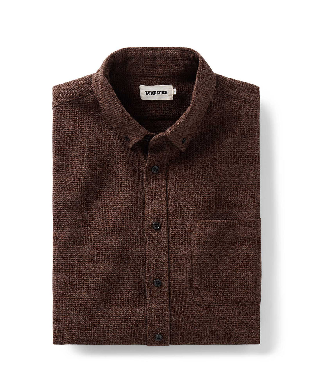 A folded Jack Shirt in Timber Twist Waffle with a collar and chest pocket, displayed on a clean white background.