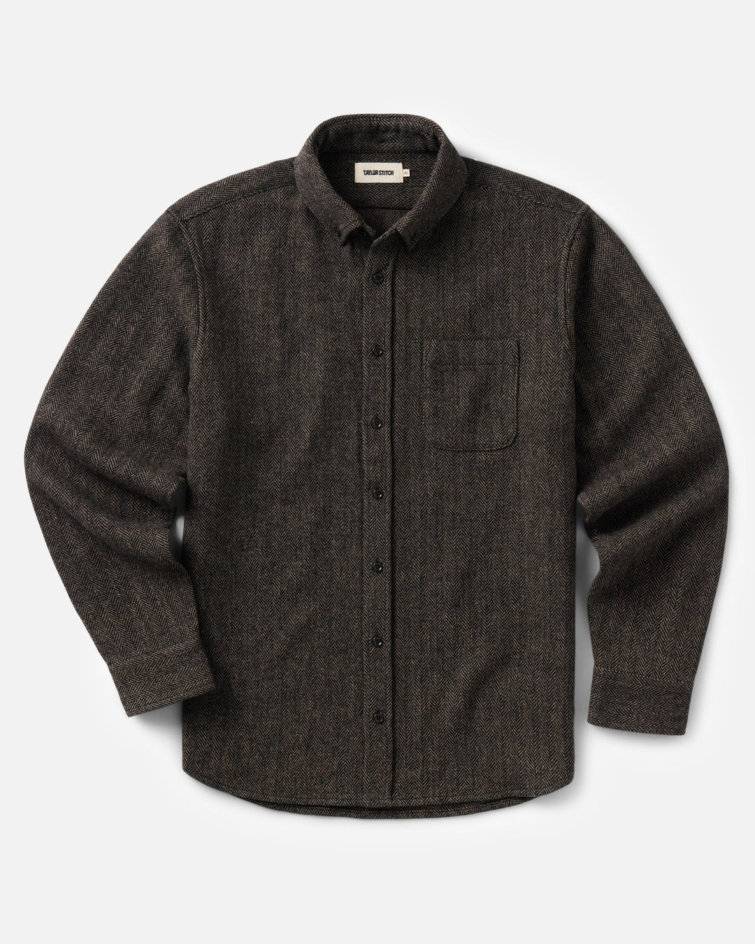 A dark brown textured long-sleeve button-up shirt with a chest pocket, displayed flat against a light gray background.