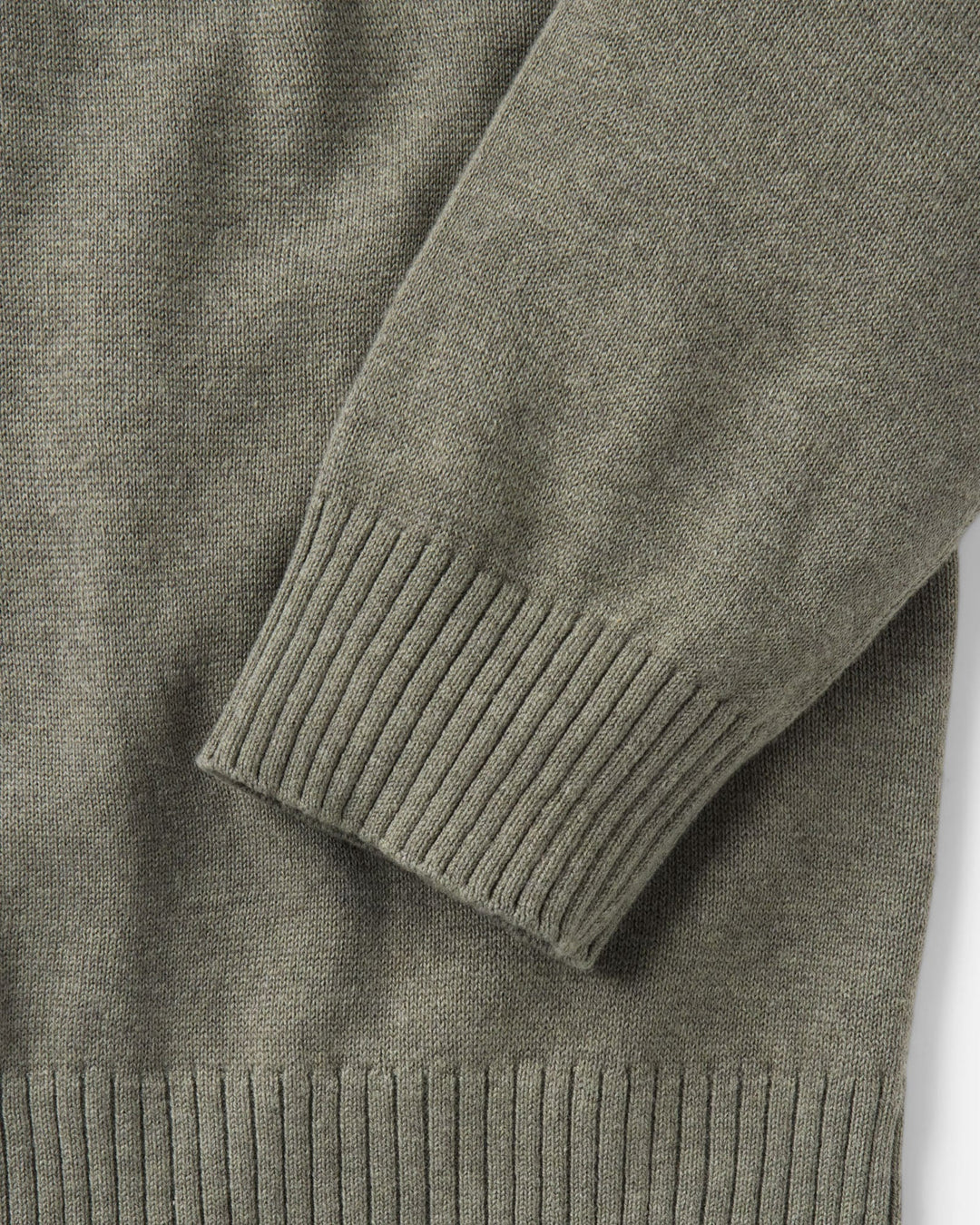 Close up of the sleeve and ribbed cuff of the Valencia Sweater Polo in Olive Cotton Cashmere.