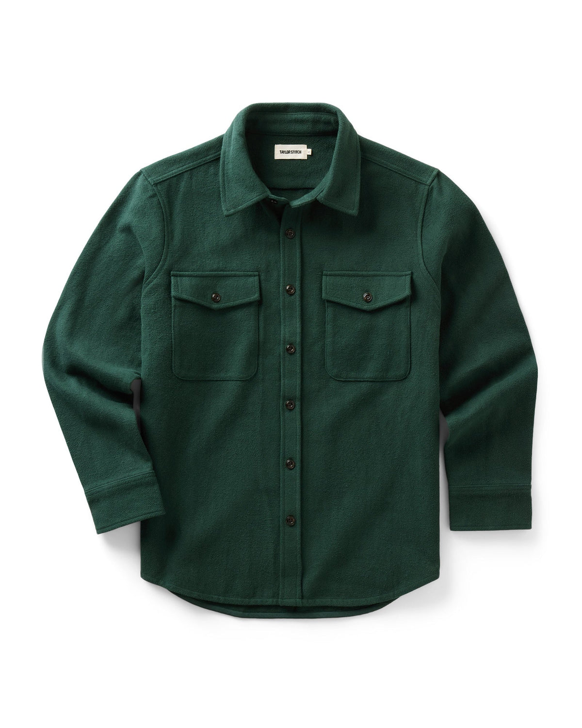 A dark forest green long-sleeve button-up maritime shirt jacket with two chest flap pockets, displayed flat against a clean white background.
