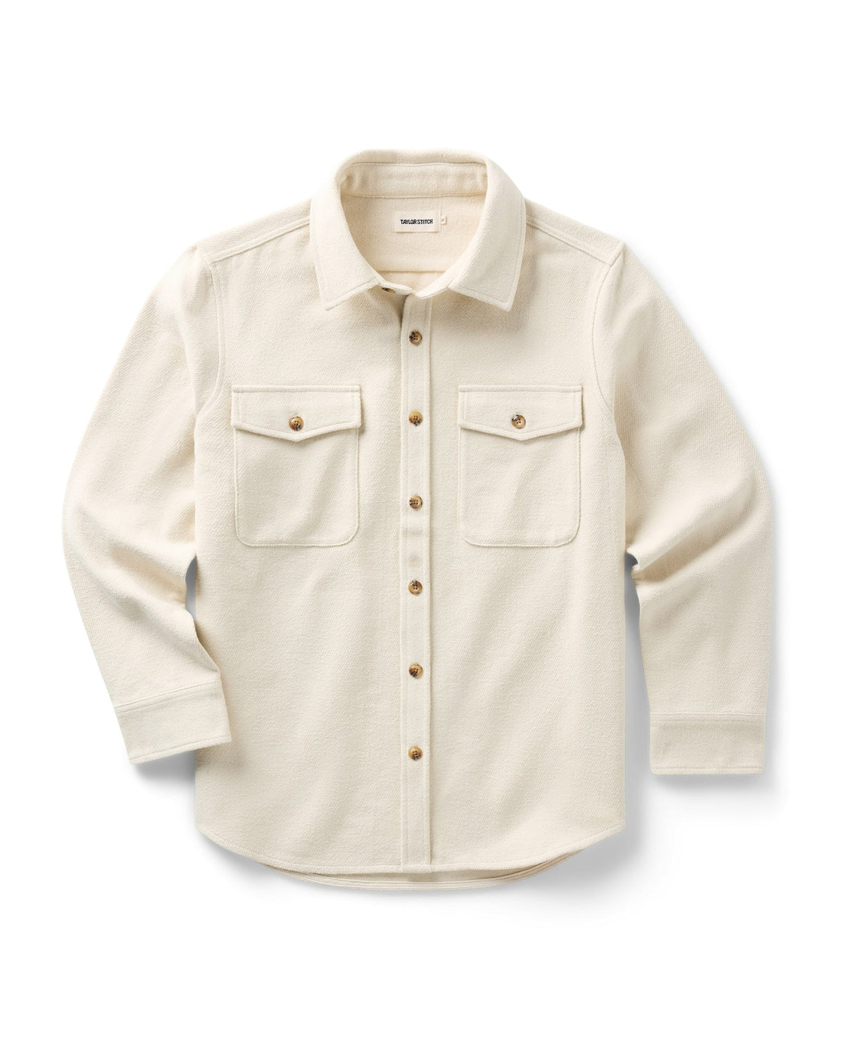 A vintage-white long-sleeve button-up maritime shirt jacket with two buttoned chest pockets, displayed flat against a white background.