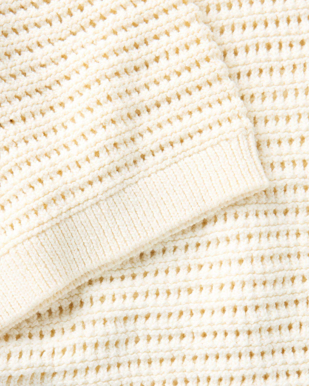 Close-up of The Monterey Sweater Polo in Vintage White Crochet